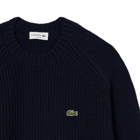Maglia Uomo in pura lana, con una scollatura girocollo e logo applicato