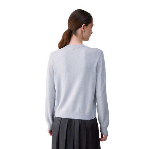 Cardigan Donna con motivo Argyle modella retro
