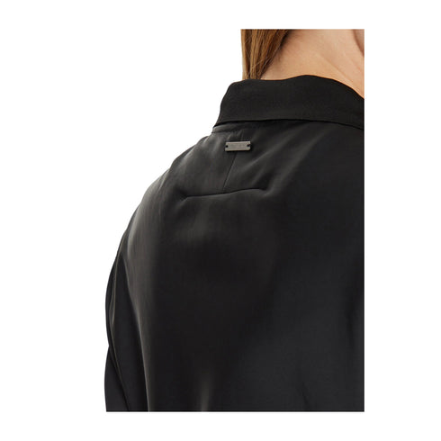 Calvin Klein Polo Polo Donna Satin a mezze maniche Nero - Francavilla Moda