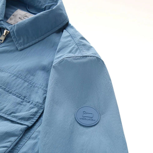 Woolrich Giubbino Giubbino Uomo Crinkle in nylon Celeste P24-WOOLRICHCFWOOS0119MRUT3718-31123-M - Francavilla Moda